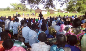 One of the community members delivers