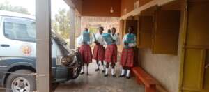Equipping the girls with materials: in safe space