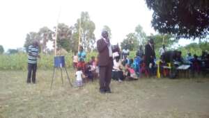 A member of KIFA sharing views & collecting data