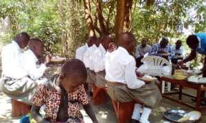 Project Leaders & other staff at meals with girls