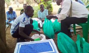 KIFA's staff distribute for them Beans