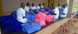 Girls sorting out uniform to be sold: market