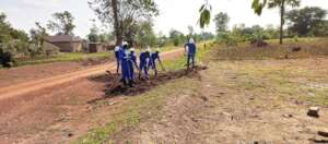 Boys clearing the site of the Institute