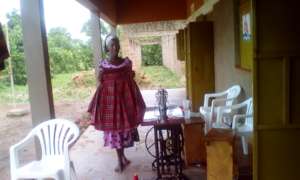 one of the girls posing with the uniform