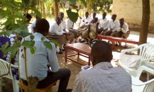 Project leaders & staff share a moment with girls