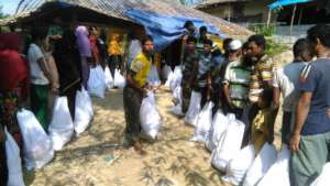 Relief Goods being Handed Over to the Refugees