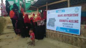 Women receiving blankets