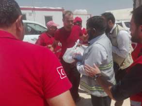 Distribution of relief goods among the Syrian