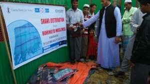 Boy Happy after Receiving Winter Clothes