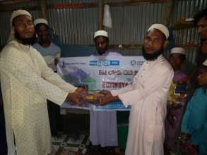 Eid Gift being Handed Over to one of the Refugee