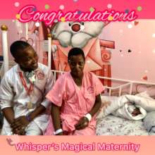 Doctor Isaac with the mother and her newborn baby