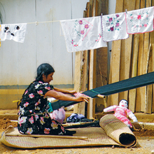 Photo: Augustina Lopez weaving. By Tom Feher.