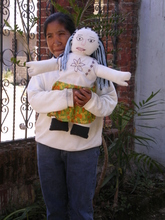 Odelia with doll she made as part of the bilingual literacy prog