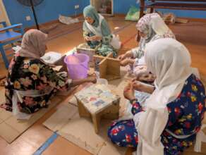 Trainees producing APT stools for children