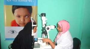 Reema screening a female villager