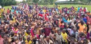 Father Christmas having fun with Children in Kenya