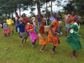 Girls playing game at Children's celebration.