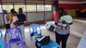 Facilitators carry participants children