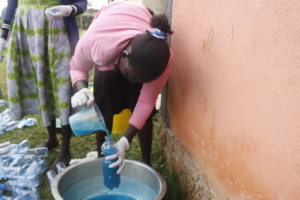 Manual soap production by women in Mt. Elgon