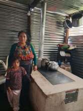 Catarina with her new stove