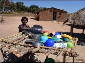 Brenda shows off her dish drying rack