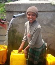 Addissu collects clean water