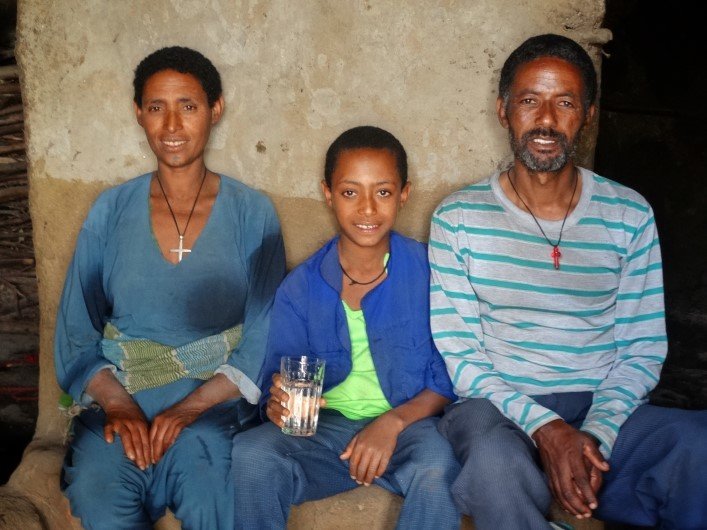 Alemnesh with her husband and of their children