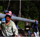 Community members laying the water pipes