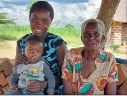 Patricia with her son and grandmother