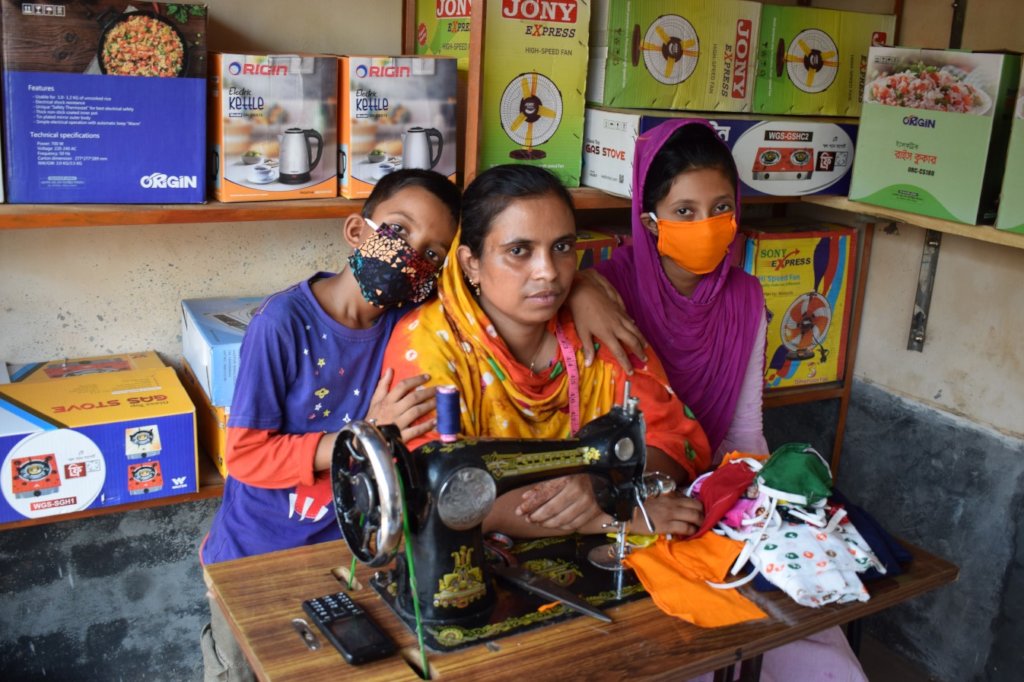Sahinoor sewing masks with Shourav (L) & Shanta (R