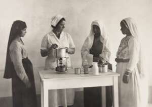 Nurses show mothers how to prepare baby formula