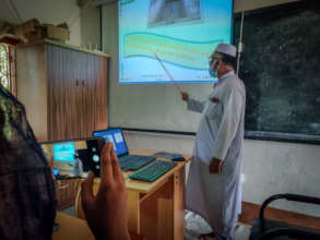 A teacher recording online class