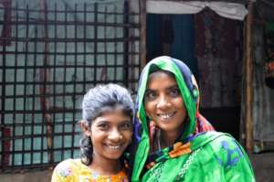 The girl from the case study with her mother.