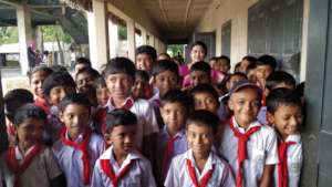 The Principal of the School with the students