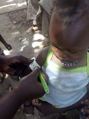 CHW taking a brachial measurement