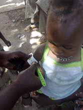 CHW taking a brachial measurement