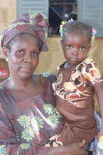 Health Worker Ami Keita with her youngest daughter