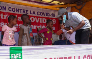 Children are interviewed during COVID-19 caravan