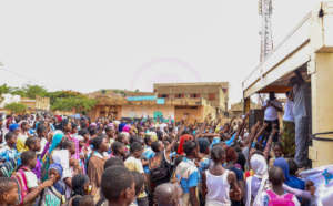 Crowd of students at caravan in Same