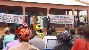 Community leaders celebrate the clinic opening