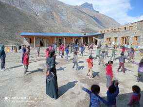Students stretching in the school courtyard