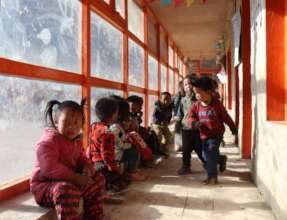 Younger students in passive solar building