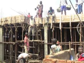Laying concrete slab for maternity ward.