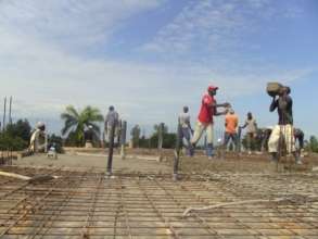 Laying concrete slab for maternity ward.