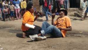 Role play at women's reproductive health seminar.
