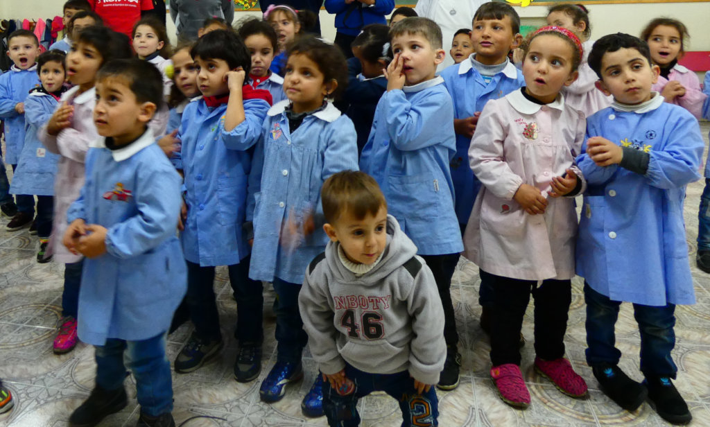 Assist kids with hearing disabilities in Palestine