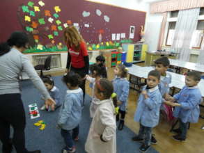 Aleimar's volunteer playing with Effeta children