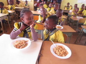 Students enjoying a meal at school