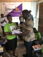 Speller receiving her prize