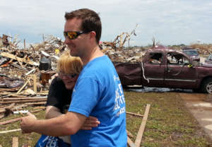 Team Member Receives Hug From Tornado Victim